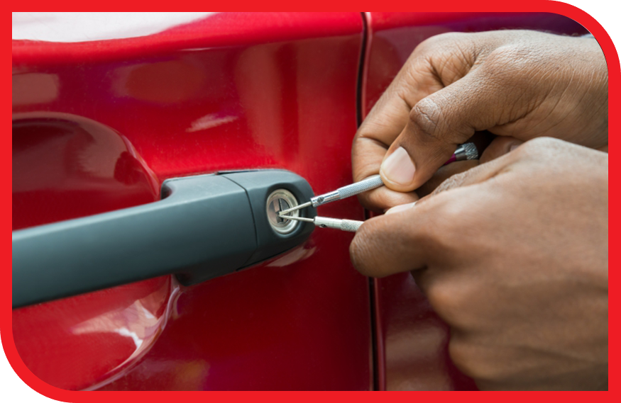 Locksmith working on a car lock.